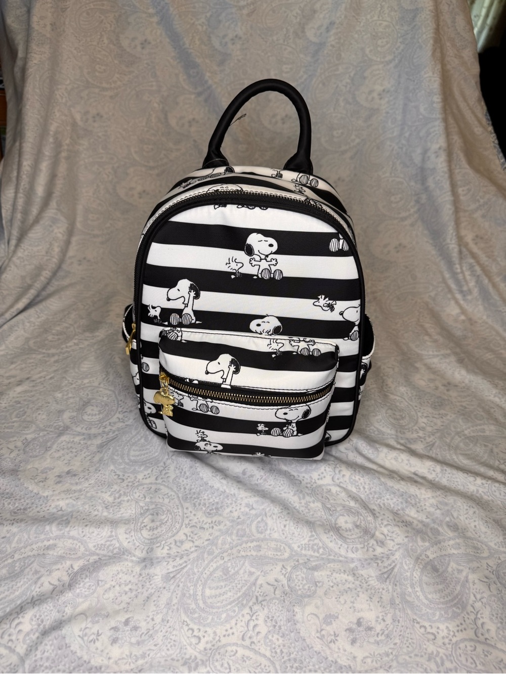 Peanuts  Snoopy Stripe Mini Backpack in beautiful 100% polyester fill & fabric.